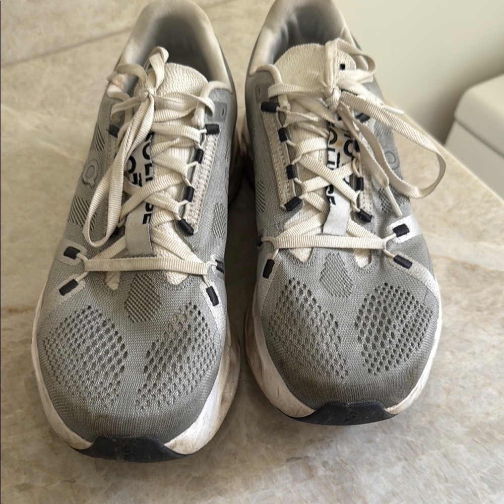 On Running Gray and White Sneakers with Mesh Upper